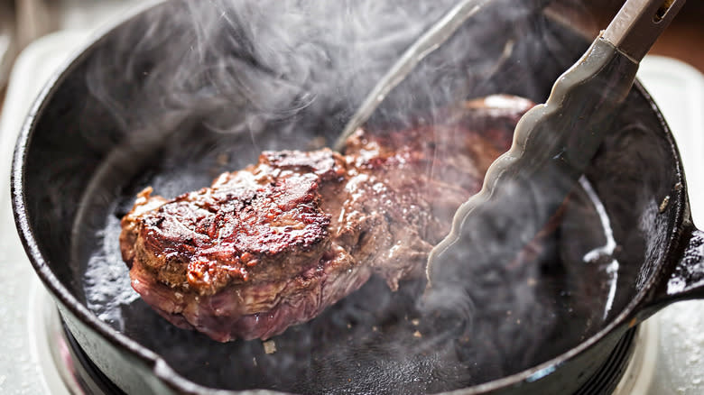 Steak in cast iron pan