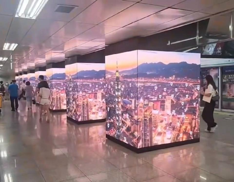 廣告影片以空拍視角環繞台北101大樓展現臺北市景，循環呈現台北從白天到傍晚、夜晚至白天的樣貌。台北市觀傳局提供