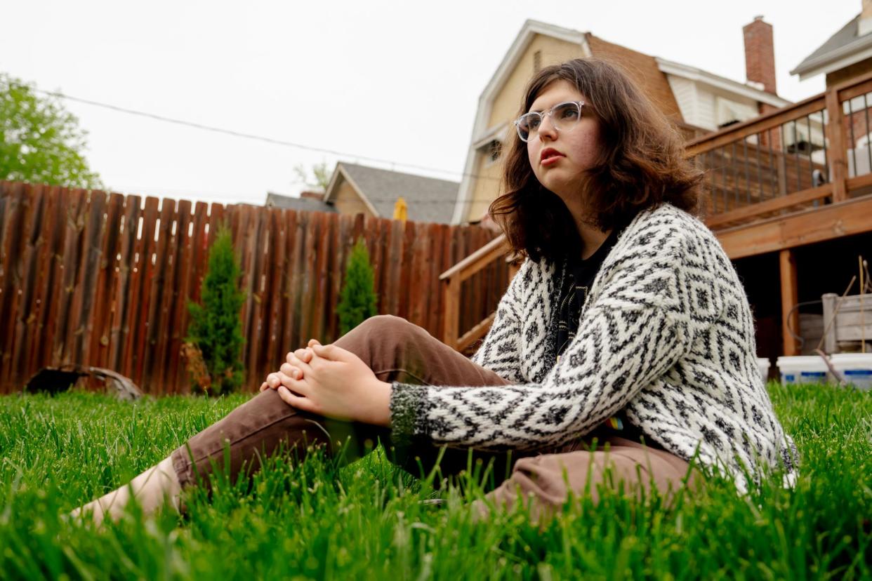 <span>Chelsea Freels, one of the hundreds of transgender Missourians who have been targeted by anti-trans policies, outside her home in Richmond Heights.</span><span>Photograph: Brian Munoz</span>