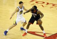 May 16, 2018; Houston, TX, USA; Houston Rockets guard James Harden (13) controls the ball against Golden State Warriors guard Klay Thompson (11) during the first half in game two of the Western conference finals of the 2018 NBA Playoffs at Toyota Center. Mandatory Credit: Troy Taormina-USA TODAY Sports