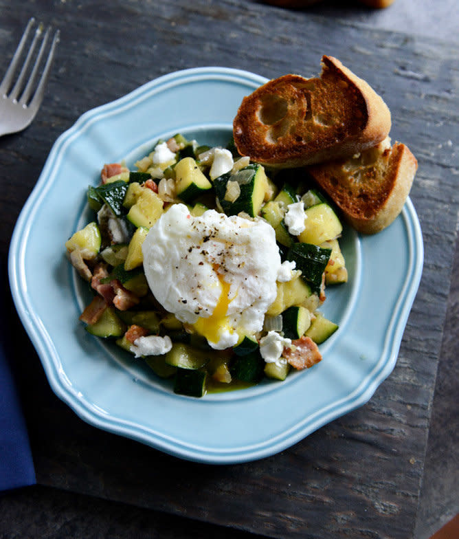 <strong>Get the <a href="Zucchini Summer Skillet with Poached Eggs + Garlic Butter Baguettes" target="_blank">Zucchini Summer Skillet with Poached Eggs & Garlic Butter Baguettes recipe</a> from How Sweet It Is</strong>