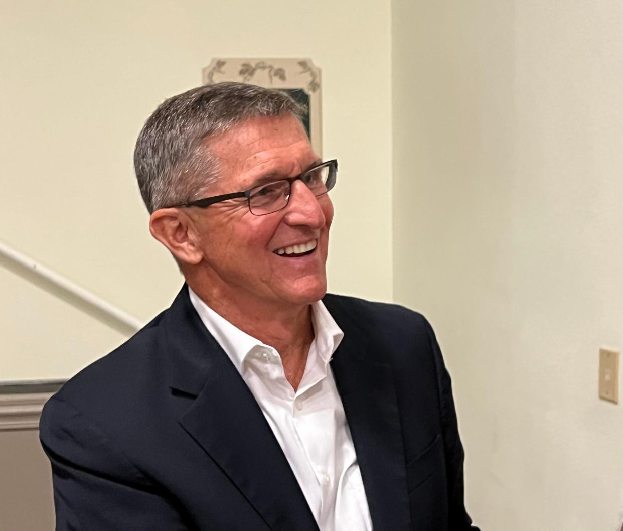 Michael Flynn, former President Donald Trump's first national security adviser, interacts with members of the audience after a speech to about 200 people in Venice, Florida, on July 12, 2023. Flynn spoke at the Venice Community Center to the Republican Club of South Sarasota County.