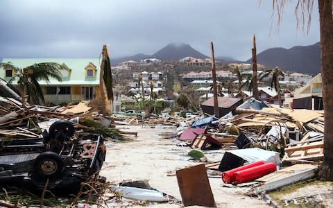 The fallout from Hurricane Irma is clear on Saint-Martin - Credit: LIONEL CHAMOISEAU/AFP