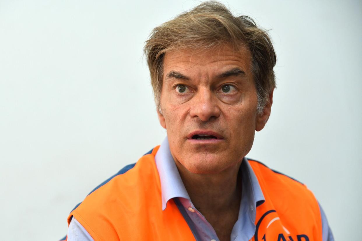 Turkish-American cardiothoracic surgeon Mehmet Oz inspects the container city's hospital as he meets with Syrian refugees during his visit to Nizip container city in Gaziantep, Turkey on July 8, 2018.