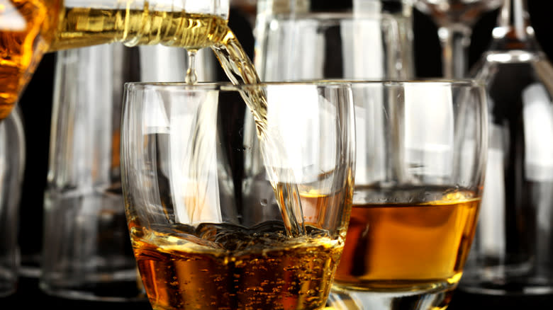 Whiskey being poured into glass