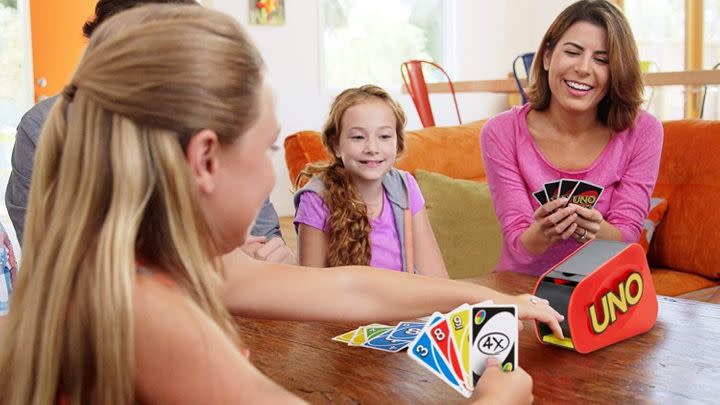 This UNO Extreme game is 36% off and takes UNO to the next level by randomly launching cards while people play!