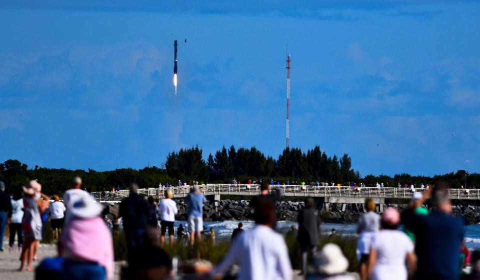 A SpaceX Falcon 9 booster lands at Cape Canaveral Space Force Station after launching the Transporter-3 mission on Thursday, Jan. 13, 2022.