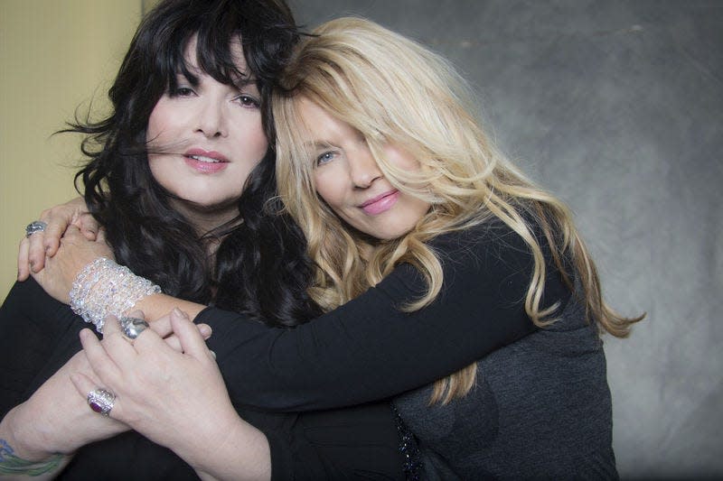 Ann, left, and Nancy Wilson will perform June 8 with their band, Heart, at The Lerner Theatre in Elkhart. Photo provided/NORMAN SEEFF