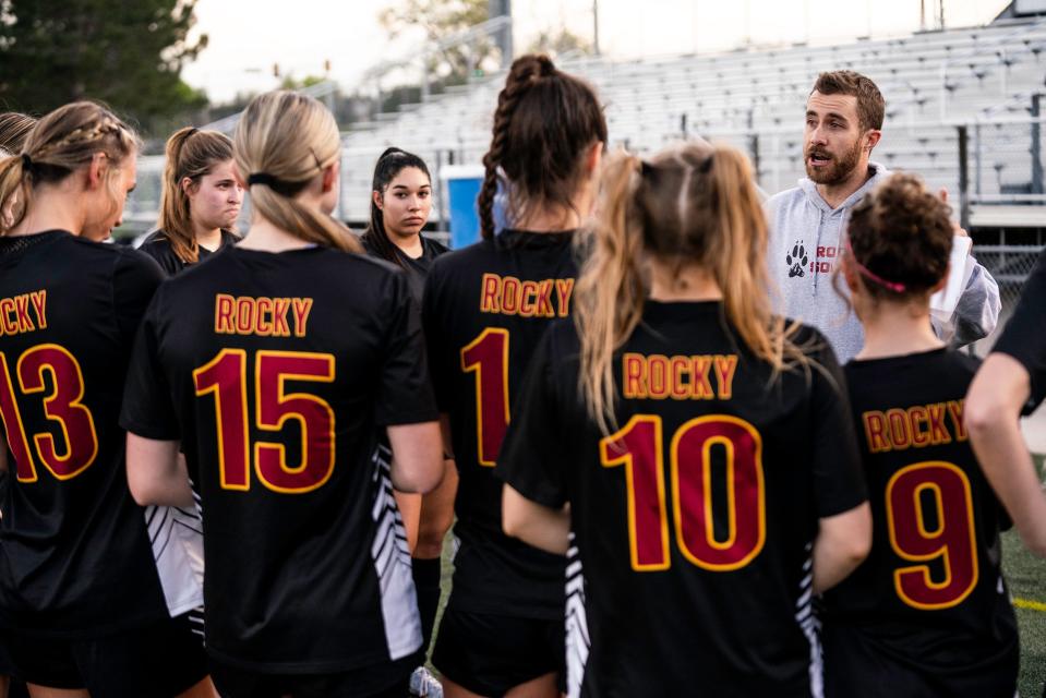 Rocky Mountain girls soccer head coach Shane Wagner talks with his team during the 5A quarterfinals at Trailblazer Stadium in Lakewood, Colo., on Monday, May 15, 2023.
