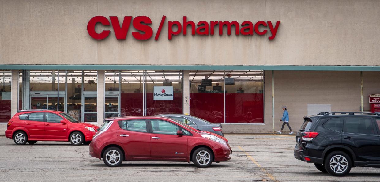 A customer walks into the CVS at 510 S College Mall Road as another pulls into a parking space on Tuesday, April 2, 2024.