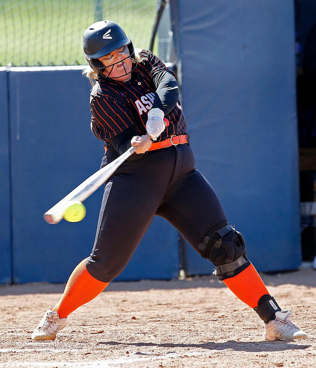 Ashland High School's Brandilyn Reymer (24) connects with a pitch for a base hit in the second inning against Springfield High School during their OHSAA Division I semifinal game Tuesday, May 17, 2022 at University of Toledo's Scott Park. Springfield won the game 10-0. TOM E. PUSKAR/TIMES-GAZETTE.COM