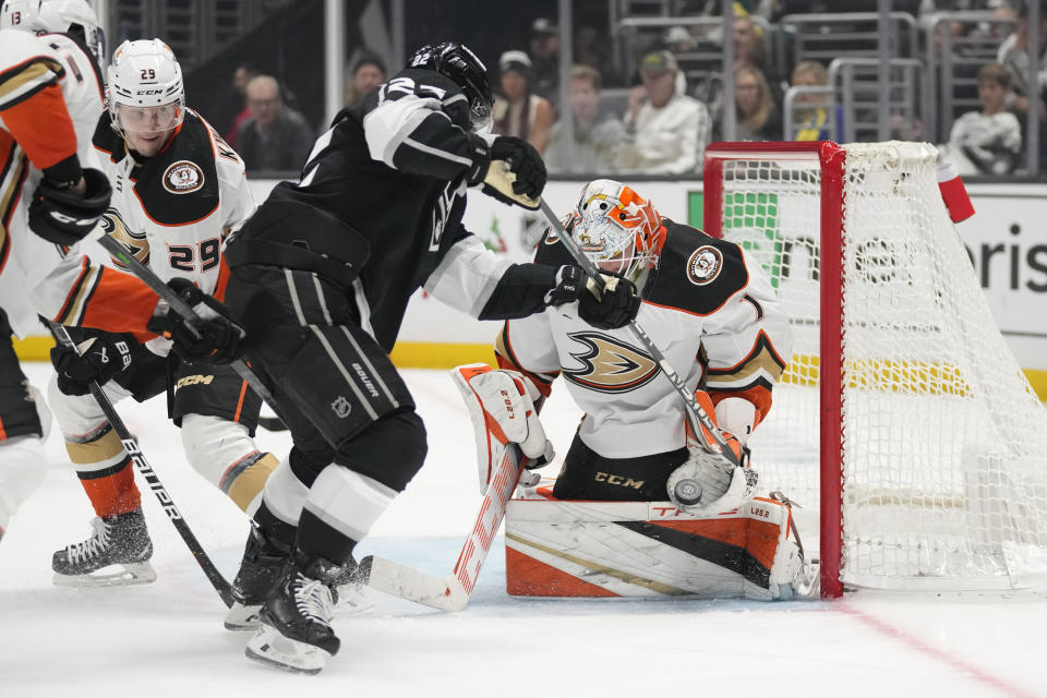 Anaheim Ducks goaltender Lukas Dostal (1) stops a shot by Los Angeles Kings left wing Kevin Fiala (22) during the second period of an NHL hockey game Tuesday, Dec. 20, 2022, in Los Angeles. (AP Photo/Ashley Landis)