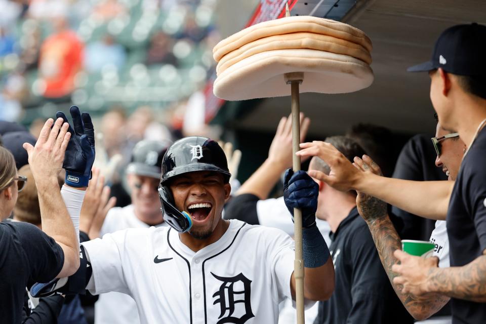 Tigers right fielder Wenceel Perez receives congratulations from teammates after he hits a two-run home run in the first inning on Sunday, April 28, 2024, at Comerica Park.