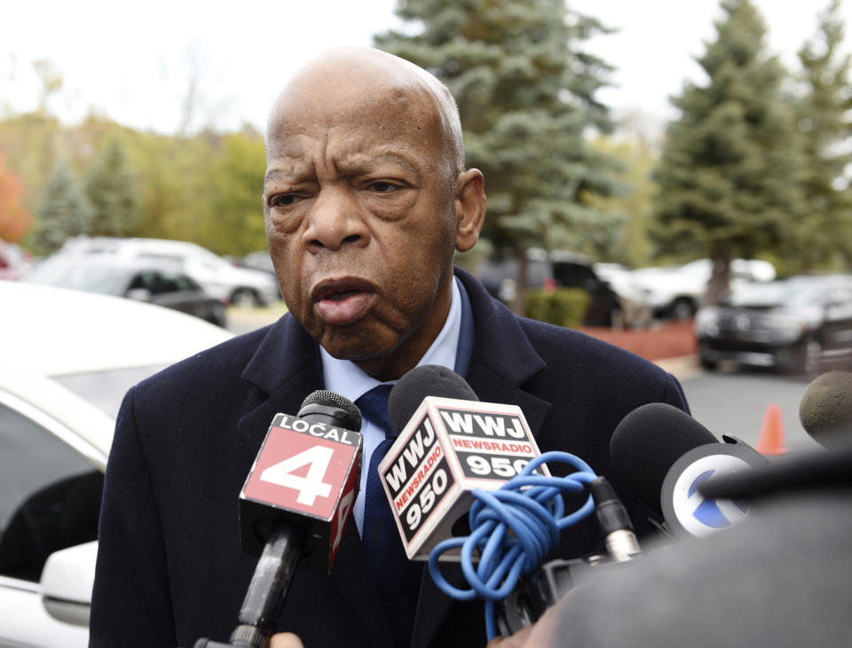 U.S. Rep. John Lewis, a friend of John Conyers Jr., talks about the life and good work of the late Congressman before he enters the church for the funeral at Greater Grace Temple in Detroit on Monday, November 4, 2019. (Clarence Tabb Jr./Detroit News via AP)