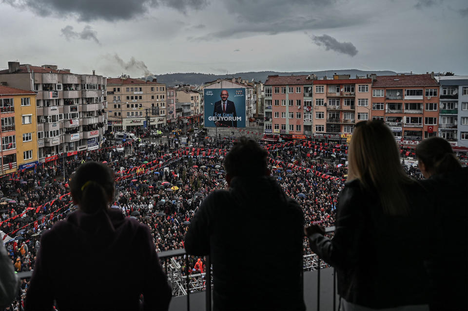 With a sea of supporters with umbrellas and hoods at his feet in Canakkale, western Turkey, on April 11, Kılıçdaroğlu, who will challenge Recep Tayyip Erdogan at the polls in May, smilingly promises "the return of spring."<span class="copyright">Ozan Kose—AFP/Getty Images</span>