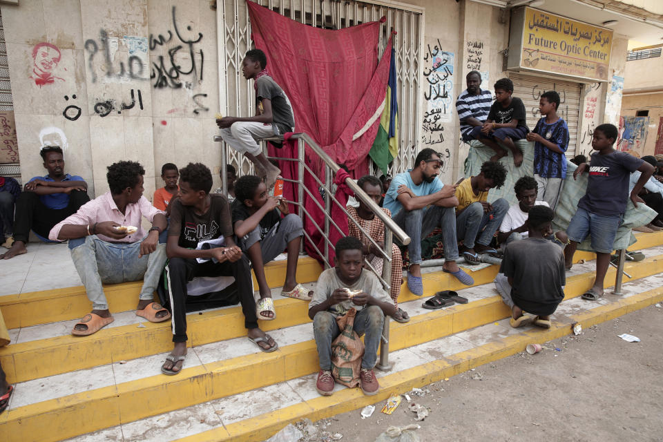 People stage a sit-in demanding a return to civilian rule and to protest the nine people who were killed in anti-military demonstrations last month, in Khartoum, Sudan, Monday, July 4, 2022. (AP Photo/Marwan Ali)