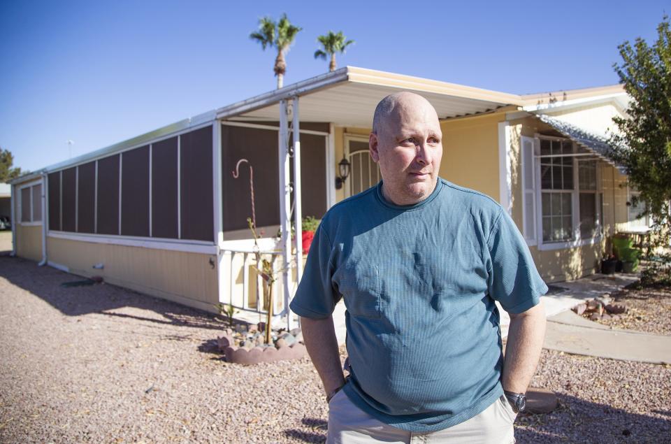 Jim Boerner, a U.S. Air Force veteran, may lose his Mesa home over a problem with his property tax payment. He poses outside his home July 8, 2019.