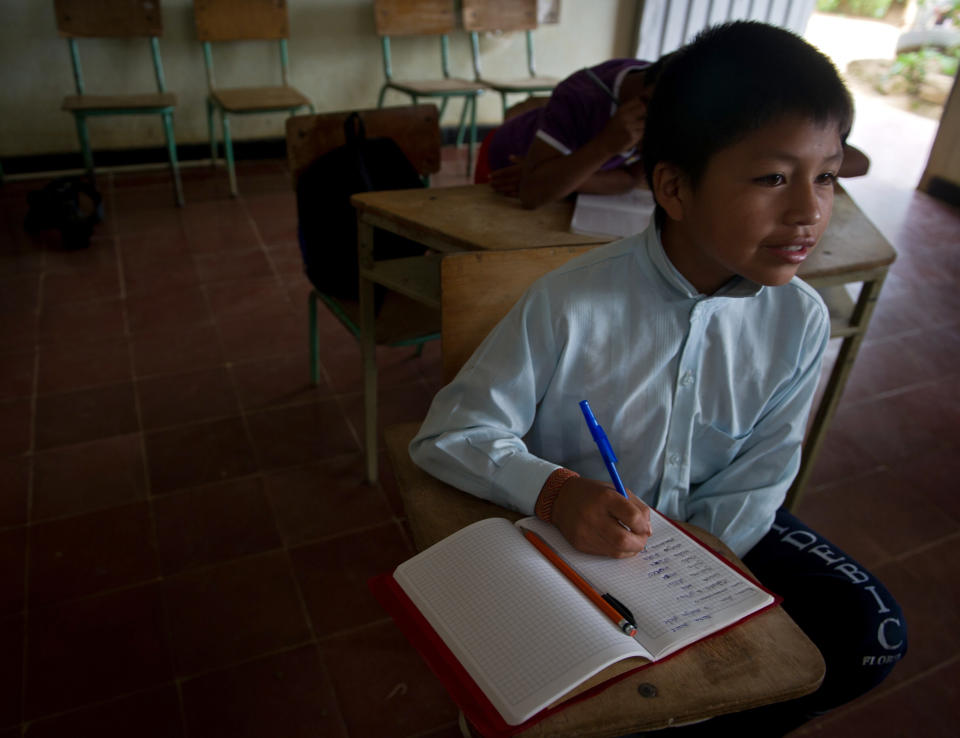 Gari Camayo Pito takes a Nasa Yuke native language class at school in the village of Las Guaca on June 21, 2013.