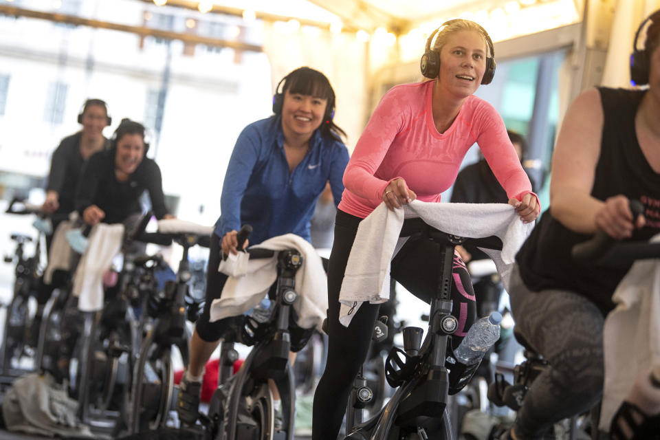 <p>People take part in a spinning class at the Selfridges department store on Oxford Street, London on the first day of its reopening as England takes another step back towards normality with the further easing of lockdown restrictions. Picture date: Monday April 12, 2021.</p>
