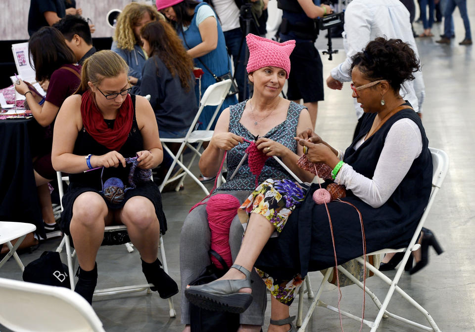 Women knit “pussy hats” during a panel at Politicon at Pasadena Convention Center on July 30, 2017, in Pasadena, Calif. (Photo: Getty Images)