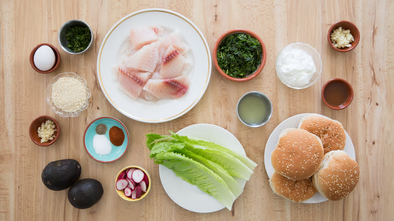 fish burger ingredients on table