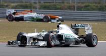 Mercedes Formula One driver Lewis Hamilton of Britain (front) drives during the qualifying session for the Korean F1 Grand Prix at the Korea International Circuit in Yeongam, October 5, 2013. REUTERS/Kim Hong-Ji (SOUTH KOREA - Tags: SPORT MOTORSPORT F1)