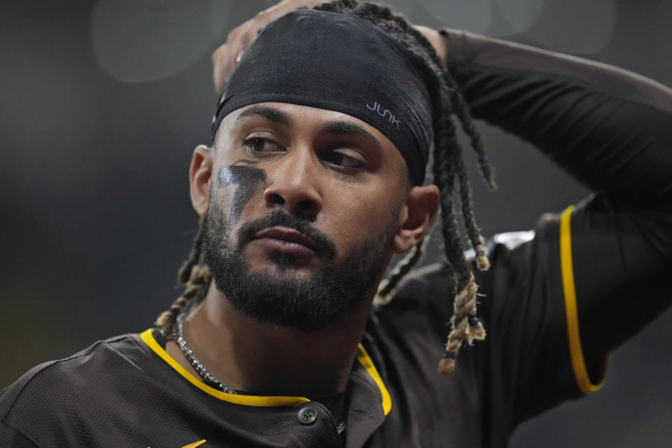 FILE - San Diego Padres' center fielder Fernando Tatis Jr. walks back to the dugout during an exhibition baseball game between Team Korea and the San Diego Padres at Gocheok Sky Dome in Seoul, South Korea, Sunday, March 17, 2024. El Niño has stormed back for Padres. (AP Photo/Lee Jin-man, File)