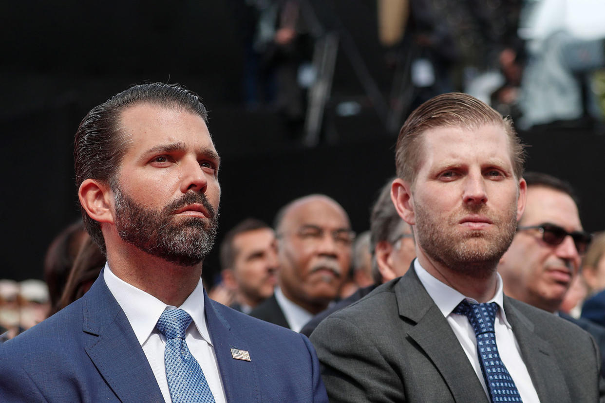 Donald Trump Jr; Eric Trump IAN LANGSDON/AFP via Getty Images