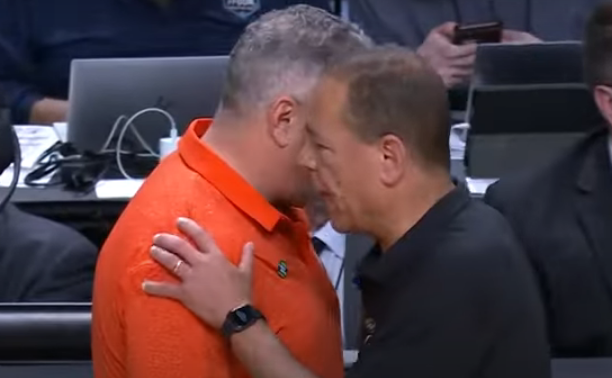 Houston Cougars head coach Kelvin Sampson greets Auburn Tigers head coach Bruce Pearl at the end of Saturday's night game. (Photo/YouTube)