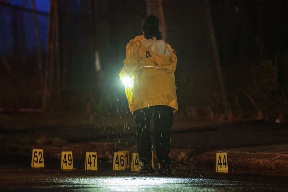 Police on the scene of a shooting Monday, July 3, 2023 in Philadelphia. Police say a gunman in a bulletproof vest has opened fire on the streets of Philadelphia, killing several people and wounding two boys before he surrendered to responding officers. (Steven M. Falk/The Philadelphia Inquirer via AP)