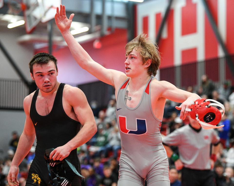 Urbandale's Kaleb German reacts after beating Southeast Polk's Andon Trout at 138 pounds during the Class 3A district 1 tournament at Carlisle High School Saturday, Feb. 12, 2022, in Carlisle.