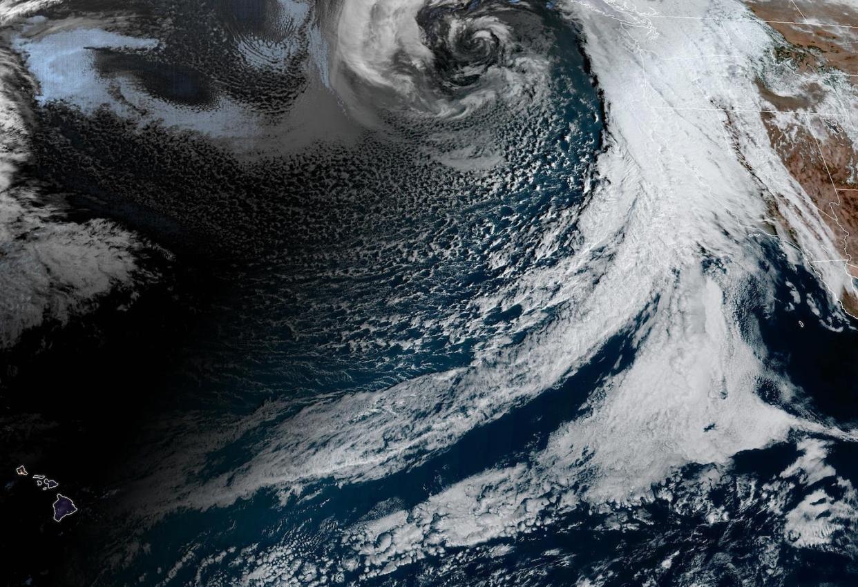 A satellite image shows a powerful atmospheric river hitting the U.S. West Coast on Jan. 31, 2024. <a href="https://cdn.star.nesdis.noaa.gov/GOES18/ABI/CONUS/GEOCOLOR/20240311721_GOES18-ABI-CONUS-GEOCOLOR-2500x1500.jpg" rel="nofollow noopener" target="_blank" data-ylk="slk:NOAA GOES;elm:context_link;itc:0;sec:content-canvas" class="link ">NOAA GOES</a>