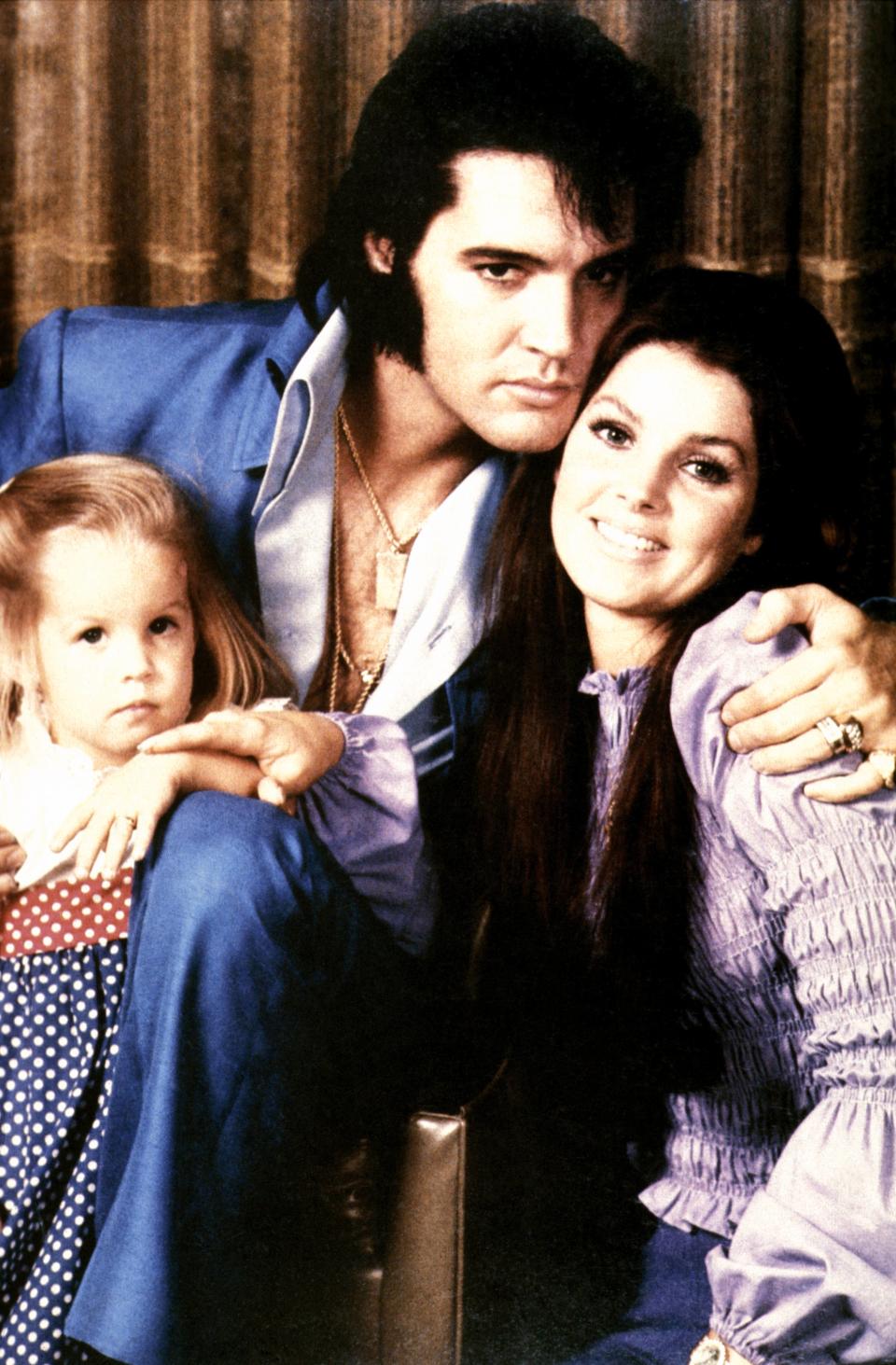 A 1970 photo of Elvis Presley and his wife, Priscilla, with their daughter, Lisa Marie. (Photo: Getty Images).