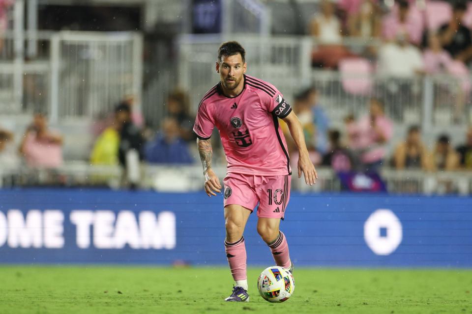 May 29, 2024; Fort Lauderdale, Florida, USA; Inter Miami CF forward Lionel Messi (10) dribbles against Atlanta United during the second half at Chase Stadium. Mandatory Credit: Nathan Ray Seebeck-USA TODAY Sports