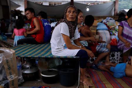 Evacuated residents rest at an evacuation centre in Iligan, while government forces fight insurgents from the Maute group in Marawi, Philippines June 27, 2017. REUTERS/Jorge Silva