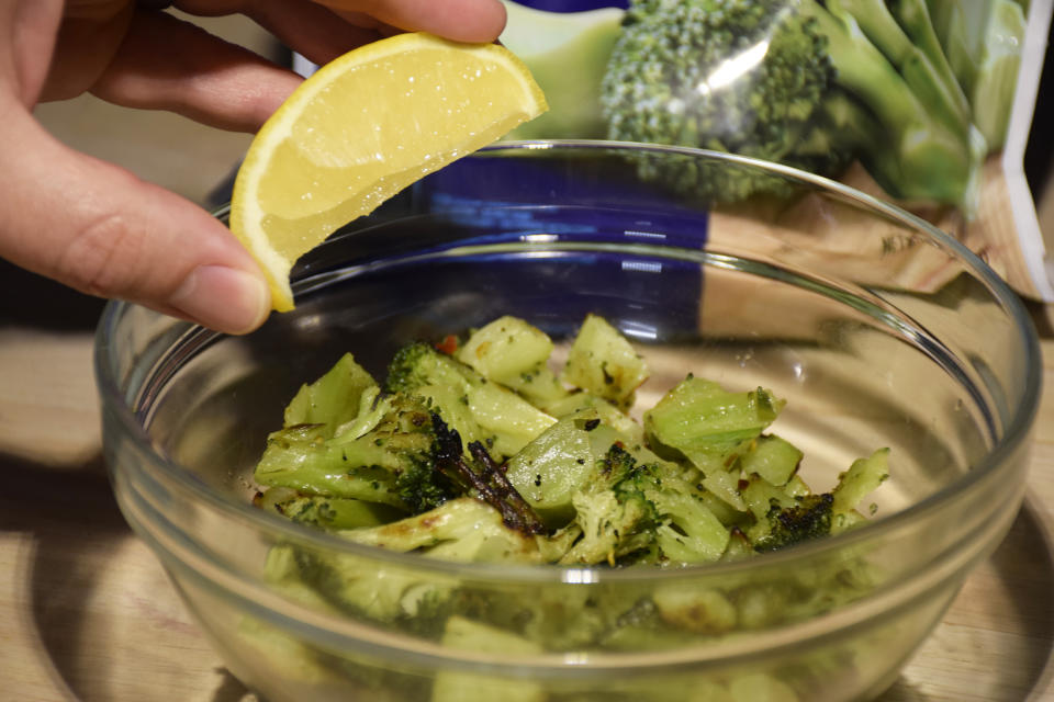 Give your roasted broccoli a squeeze of lemon to help brighten up the flavor. (Vidya Rao)