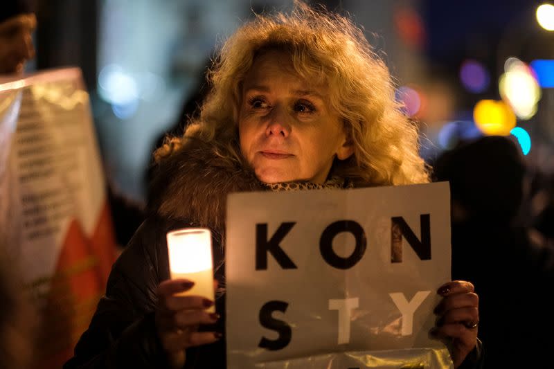 People take part in an anti-government protest in support of free judiciary in Rzeszow