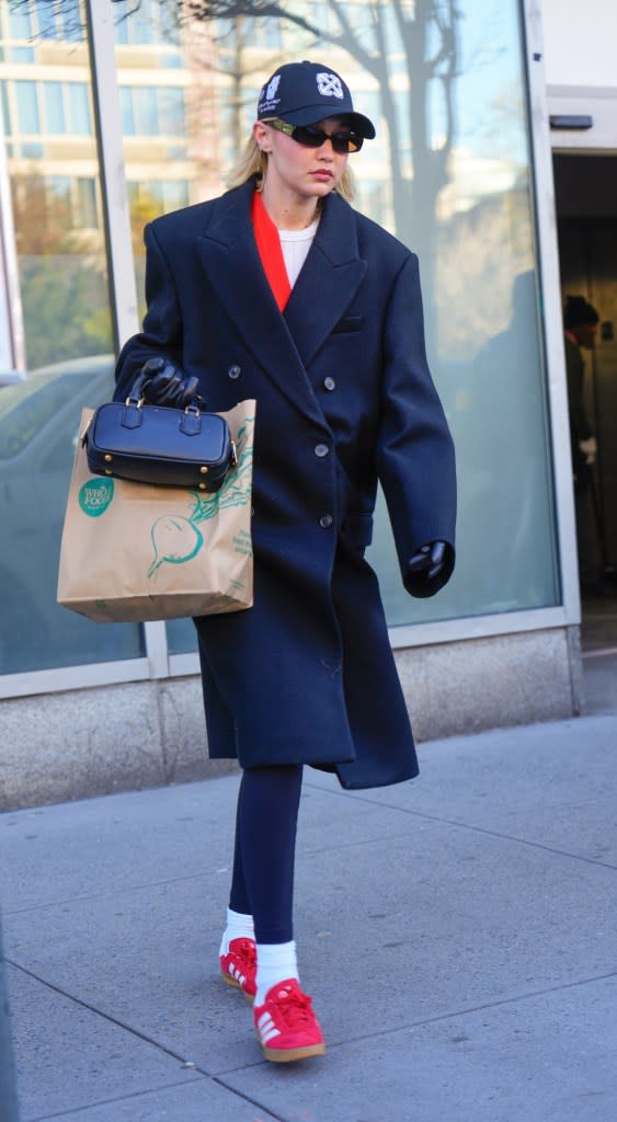 Gigi Hadid Adds a Pop of Red to Wintry Neutrals While Out in NYC