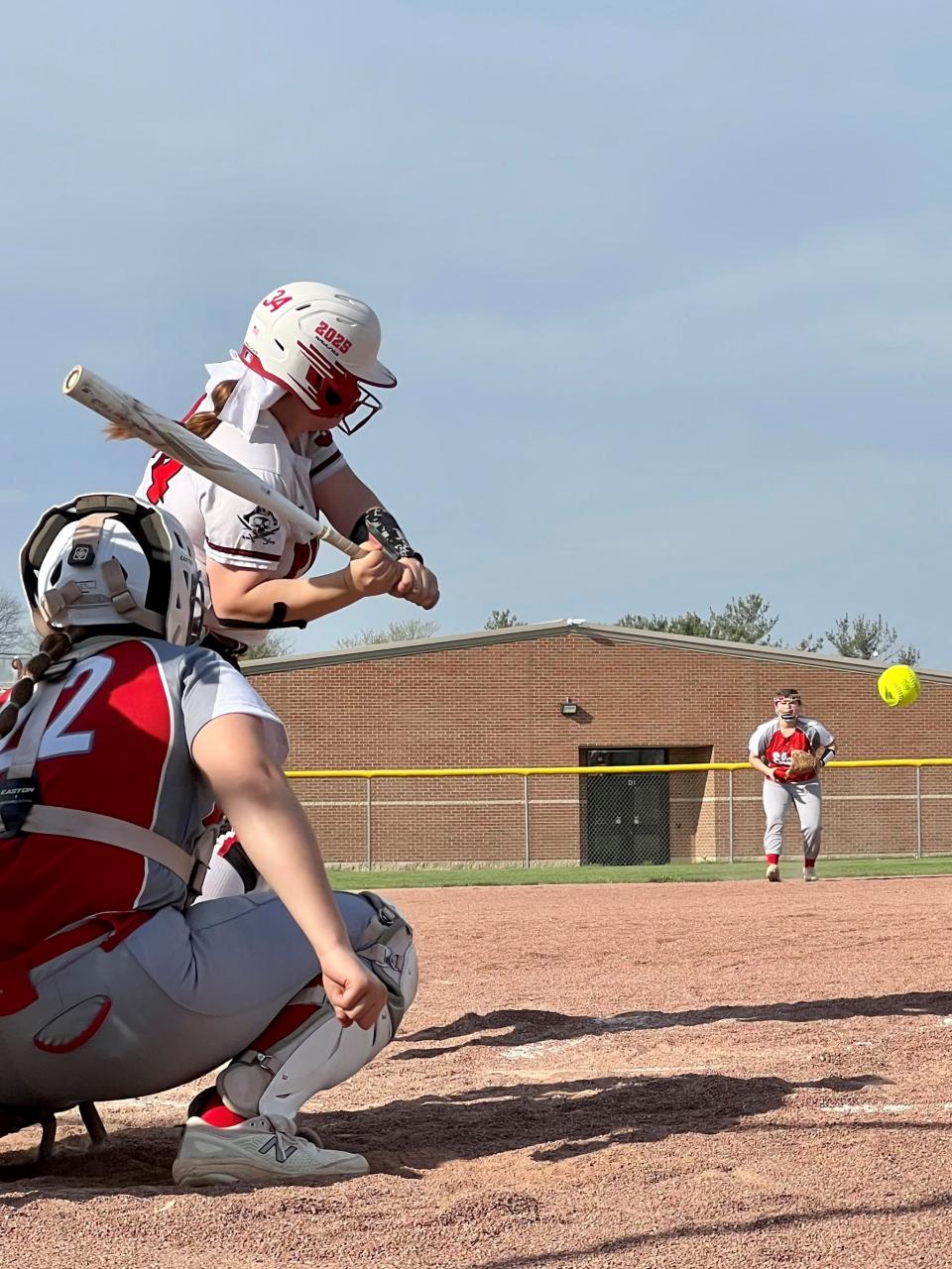 Cardington's Ari Simpson gets ready to swing at a pitch during a softball game with Elgin. The outcome was a 7-7 tie after 12 innings due to darkness at Cardington.