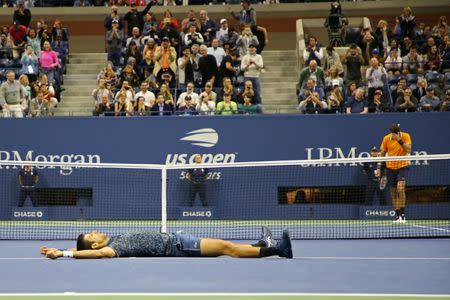 Sep 9, 2018; New York, NY, USA; Novak Djokovic of Serbia celebrates after match point against Juan Mart’n Del Potro of Argentina (R) in the men's final on day fourteen of the 2018 U.S. Open tennis tournament at USTA Billie Jean King National Tennis Center. Mandatory Credit: Geoff Burke-USA TODAY Sports