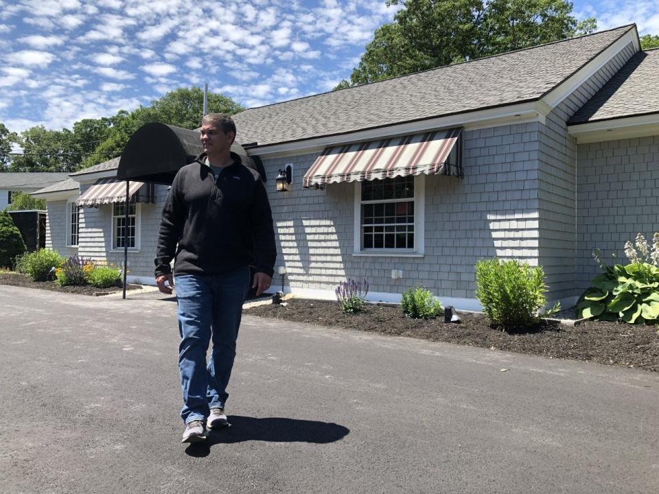 Brad Moll, a co-owner of Brickyard Hollow Brewing Company, is seen here at the company's newest location, at 335 Main Street in Ogunquit, Maine, on Tuesday, June 21, 2022.