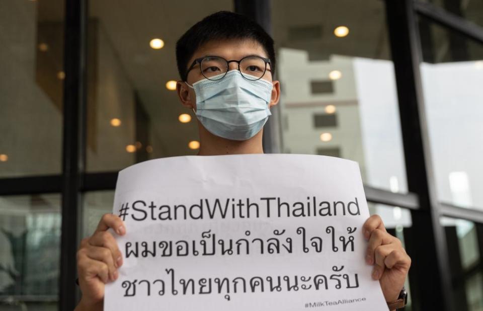 A pro-democracy protester at the Royal Thai Consulate-General in Hong Kong.