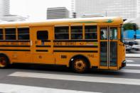 School bus drivers take part in caravan to demand proper funding for schools to support distant learning and a safe return to classes, in Los Angeles