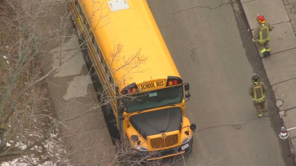Toronto Fire Services is investigating after a sinkhole opened up under a parked school bus in Toronto. 
