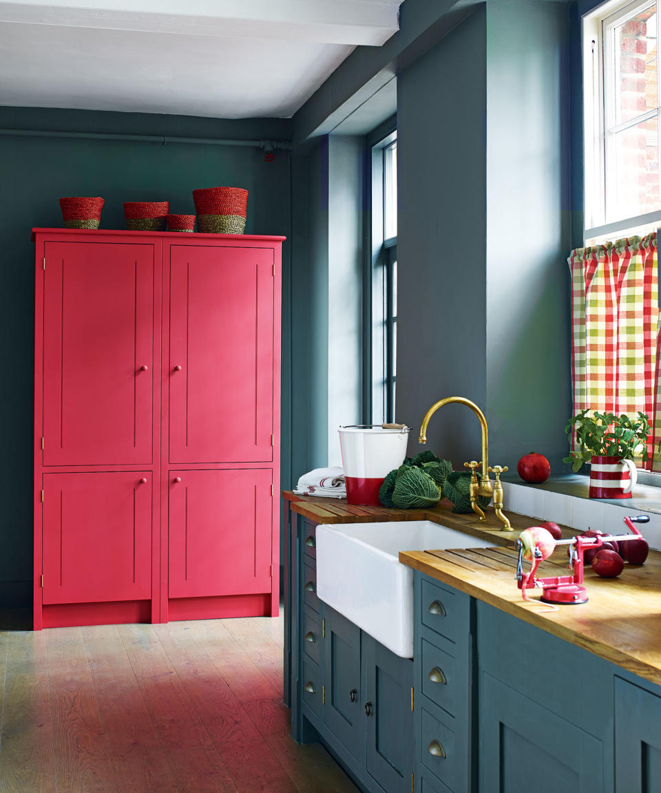 Paint a kitchen cabinet in red to create contrast