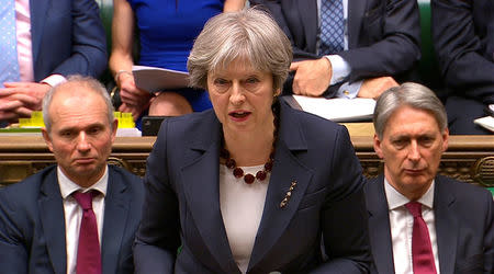 Britain's Prime Minister Theresa May addresses the House of Commons on her government's reaction to the poisoning of former Russian intelligence officer Sergei Skripal and his daughter Yulia in Salisbury, in London, March 14, 2018. Parliament TV handout via REUTERS