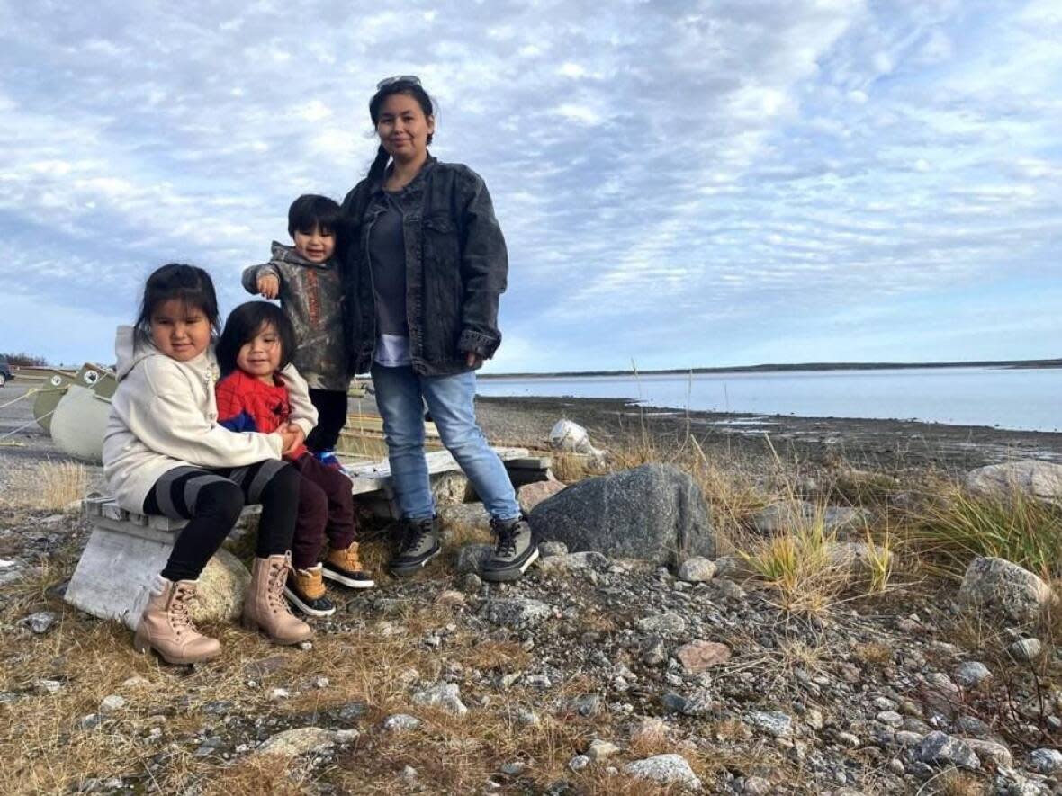 Heather House and some of her children are seen in Chisasibi, near the James Bay region, Quebec on Oct. 23, 2022. (Stephane Blais/The Canadian Press - image credit)