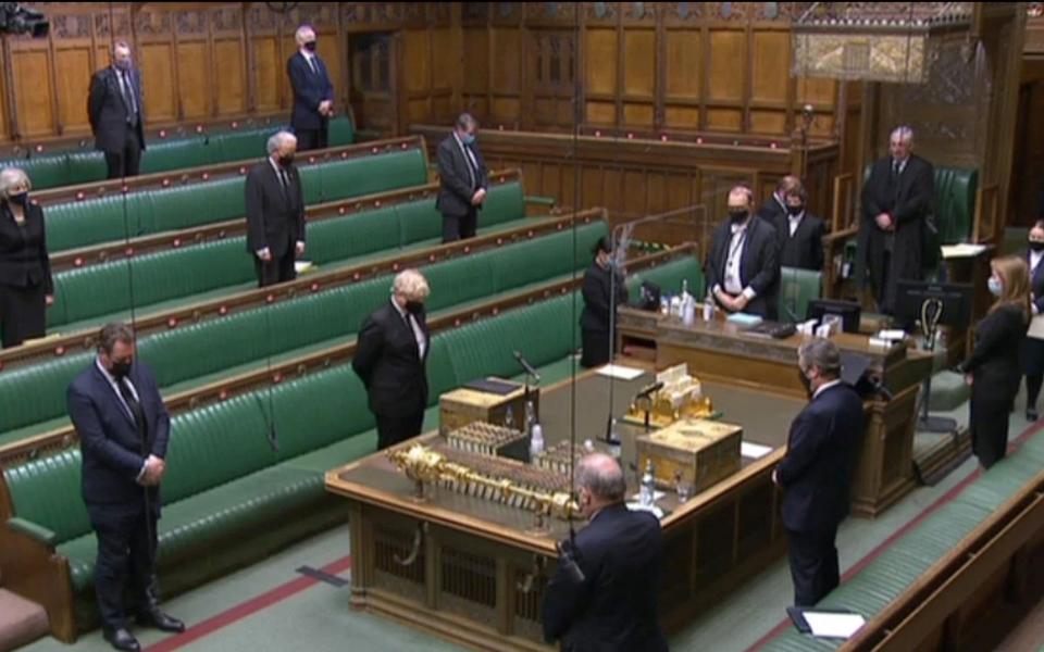 Boris Johnson and other MPs observing a minute's silence ahead of a Humble Address expressing the sympathies of the House on the death of Britain's Prince Philip - AFP via Getty 