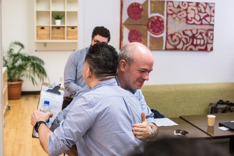 Manuel Duran, left, and Mauricio Calvo, executive director of Latino Memphis, hug before a press conference talking about Duran's time in U.S. Immigration and Customs Enforcement detention and what's next at the Latino Memphis offices on Wednesday, July 17, 2019. Duran spent 465 days in detention before being released on bond from the Etowah County Detention Center on July 11.