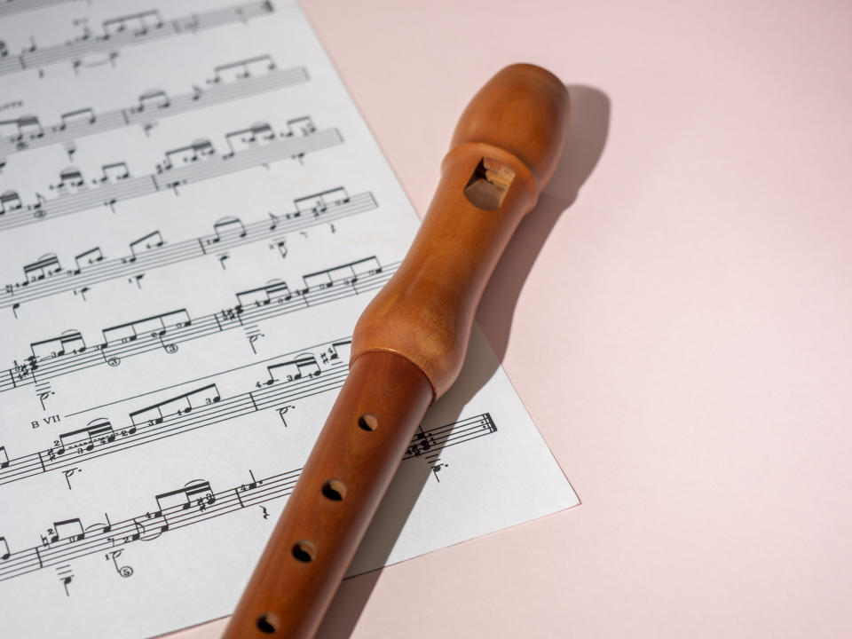 A recorder with sheet music